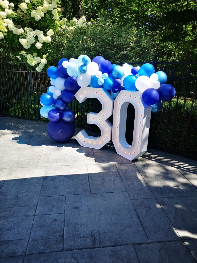 marquee numbers in Welland framed by a balloon arch